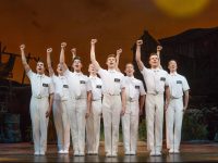 Joel Granger and Mormon Ensemble in THE BOOK OF MORMON. Image Jeff Busby